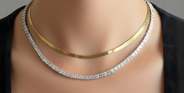 Woman wearing SammiBee 925 Sterling Silver + thick 18K Gold Plated tennis necklace and bracelet set — everyday luxury jewelry